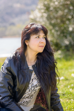 Rome, Italy - March 24, 2015: Portrait of a girl at castel Gandolfo Lake, a little town near Rome Italyの写真素材