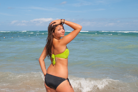 Beautiful and sexy girl posing at the beach in dominican republicの写真素材