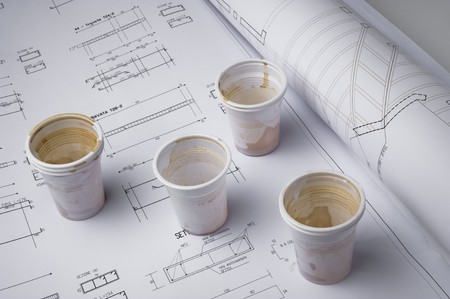 Coffee cups on draftの写真素材