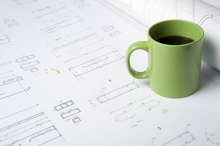 Coffee cup on drawingsの写真素材