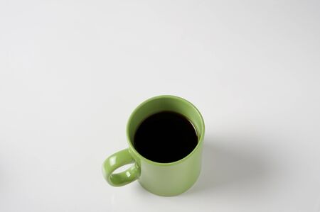 Coffee cup isolated on white, high angle view