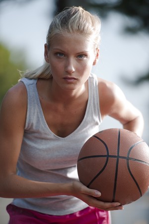 Basketball player ready to pass the ballの写真素材