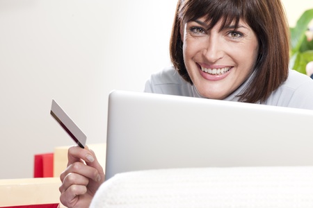 Woman doing online shoppingの写真素材