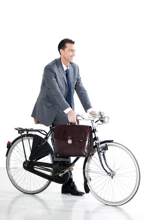 Businessman With Old-Fashioned Bicycle; Concept: I go Greenの写真素材