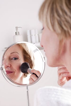 Mature Woman Making Upの写真素材