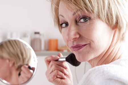 Mature Woman Making Upの写真素材