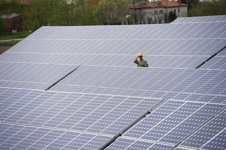 Technician at solar power station