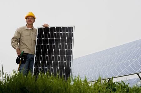 Technician with solar panel