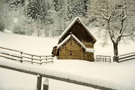 Timber House In Snowy Landscapeのeditorial素材