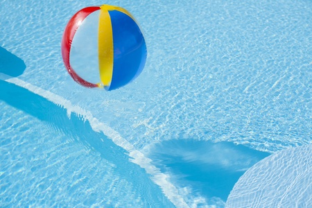 Beach ball on swimming-poolの写真素材