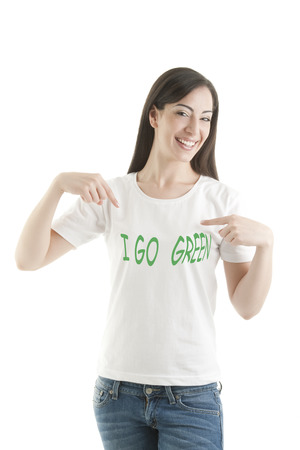 Girl with the words 'I GO GREEN' on her t-shirtの写真素材