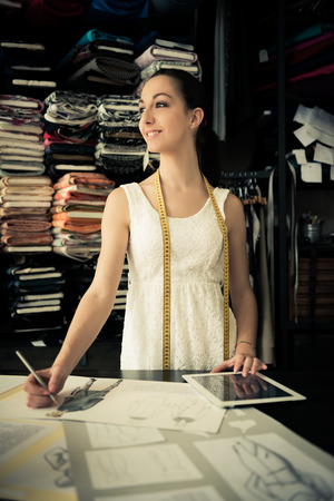 Young fashion designer using PC tabletの写真素材