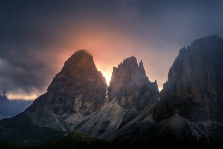 a colorful stormy sunset over Dolomite Pass