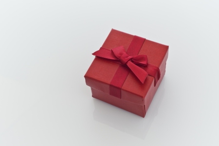 Red Gift Box, with a Red Bow, on a white background