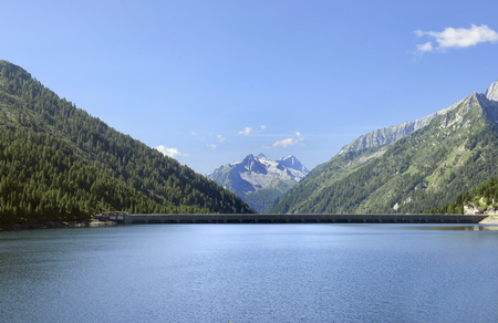 Landscape mountains Lake Dam in Trentino Dolomites Alps Italy の写真素材