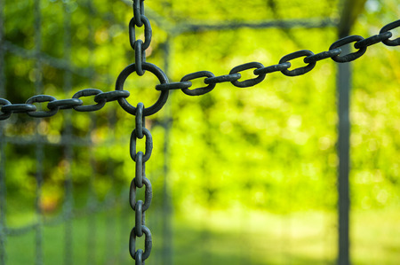 soccer goal with chains in the summer with green nature, street soccer goalの写真素材