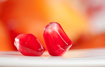 pomegranate pits with natural backgroundの写真素材