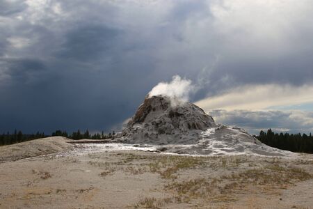 Beautiful Dome Geyser in the firehole loop in the Yellowstone National Parkの写真素材