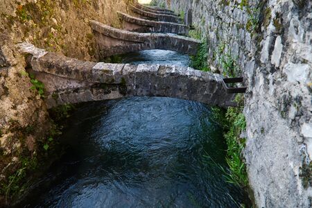 Italy, Vittorio Veneto, view Serravalle neighboord and its water channelsの写真素材
