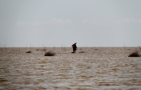 Fisherman in the Tonle Sap lake, Cambodia