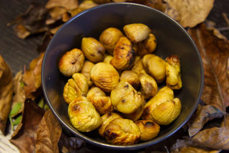 Flavors of autumn, sweet roasted chestnutsの写真素材