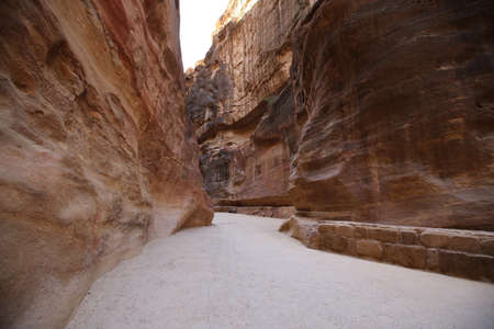 The Siq of Petra with its beautiful rocksの写真素材