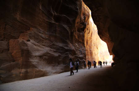 The midday lights penetrate the Siq of Petraの写真素材