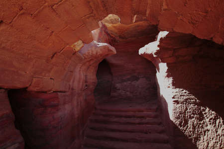 Stairs carved into the rock of the Nabataean theater in Petraの写真素材