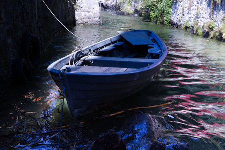 Boat moored in Lake Garda, Italyの写真素材