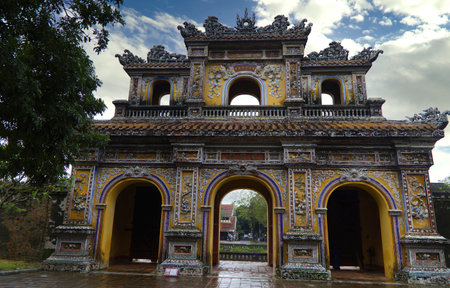 Finely decorated triple door inside the Forbidden Citadel in Hue, Vietnam