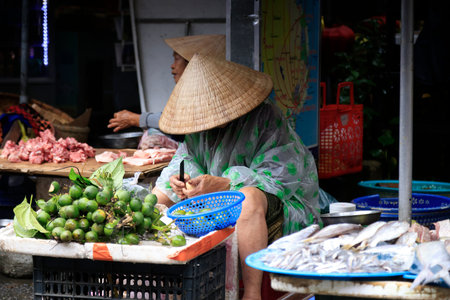 The lively market in Hoi An, Vietnamの写真素材