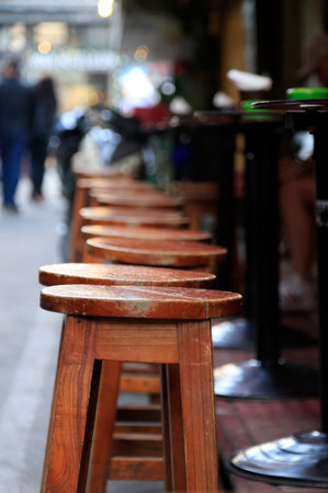 Stools await customers on the food street in Hanoi, Vietnam