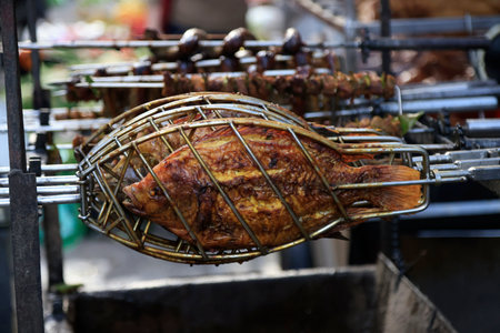 Fish being cooked in the market of Old Hanoi, Vietnam