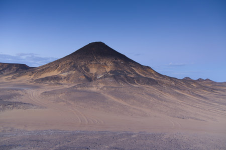 Sunset lights on the black desert in Egyptの写真素材