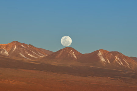 Spectacular moon over the Atacama Desert at sunset, Chileの写真素材