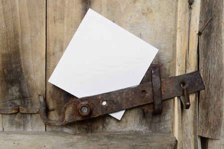 Door with a white sheet of paperの写真素材