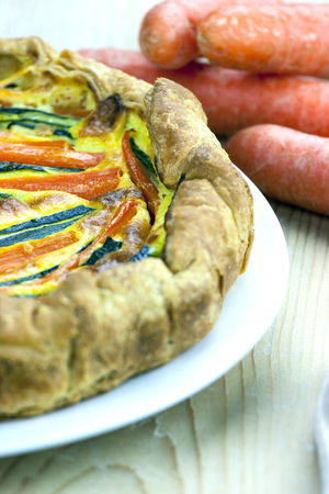 Italian savoury pie with carrots and zucchiniの写真素材