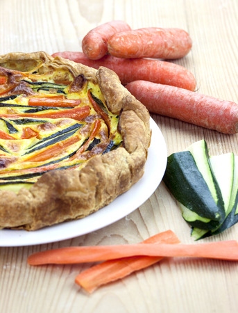 Italian savoury pie with carrots and zucchiniの写真素材