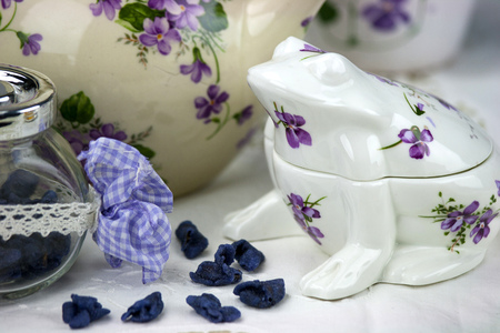 English afternoon tea with sweet and candied violetsの写真素材