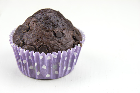 Close up of chocolate muffins on a white backgroundの写真素材