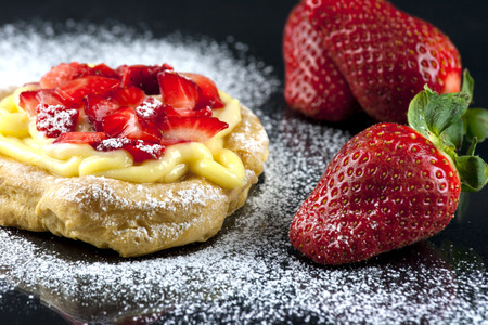 Italian pastry consisting of a deep-fried dough ball of varying size but typically about 4 inches...