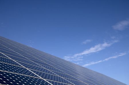 Solar panels for energy saving with blue sky behind
