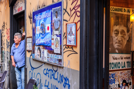 A pub manager despaired with the lack of business in Spaccanapoli, Naples, Campania, Italy on September 2017のeditorial素材