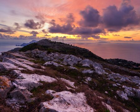 Orange invasion above Punta Campanella, Amalfi coast, Province of Naples, Campania, Italyの写真素材