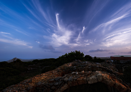 High altitude clouds hovering the lands of Kythira, Cyclades, Ionan and Mediterranean Sea, Greece, Europe.の写真素材