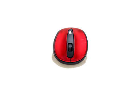 Red black computer mouse on a white background from several anglesの写真素材