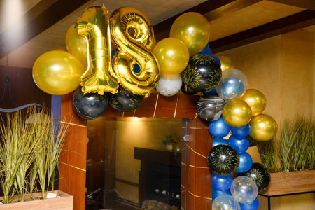 Decorative birthday balloons set as background and decoration with number eighteen.の写真素材