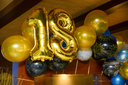 Decorative birthday balloons set as background and decoration with number eighteen.の写真素材
