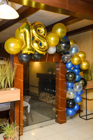 Decorative birthday balloons set as background and decoration with number eighteen.の写真素材