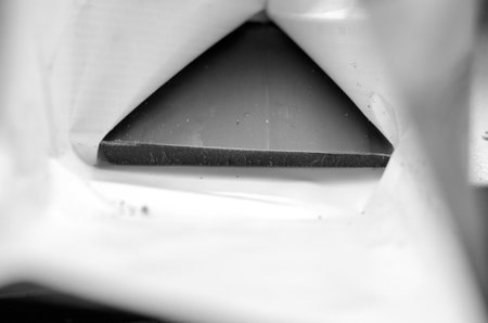 Abstract shape from the rest of the item in the semi-open original packaging
